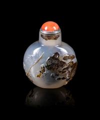 A Carved Black and Grey Agate Snuff Bottle Height overall 2 1/8 inches. — 19TH CENTURY