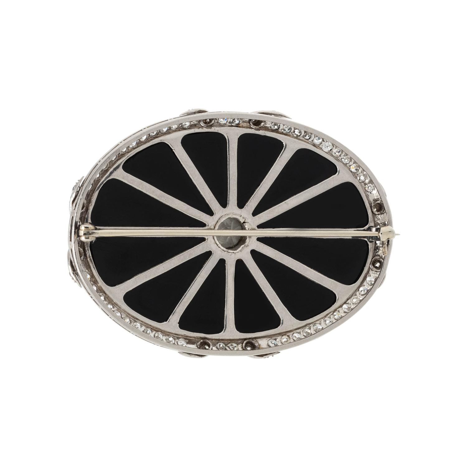 ART DECO, DIAMOND AND ONYX BROOCH