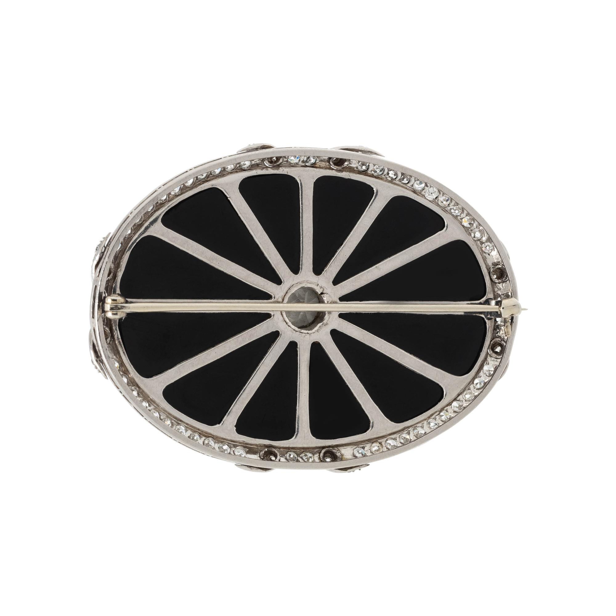 ART DECO, DIAMOND AND ONYX BROOCH