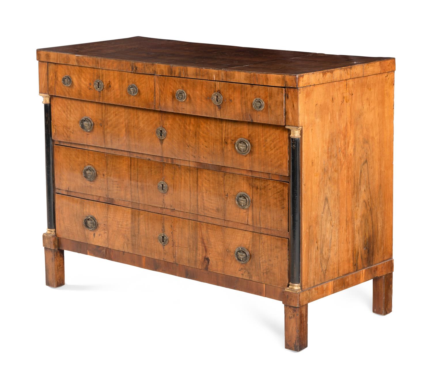 An Empire Walnut and Parcel Ebonized Commode