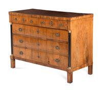 An Empire Walnut and Parcel Ebonized Commode