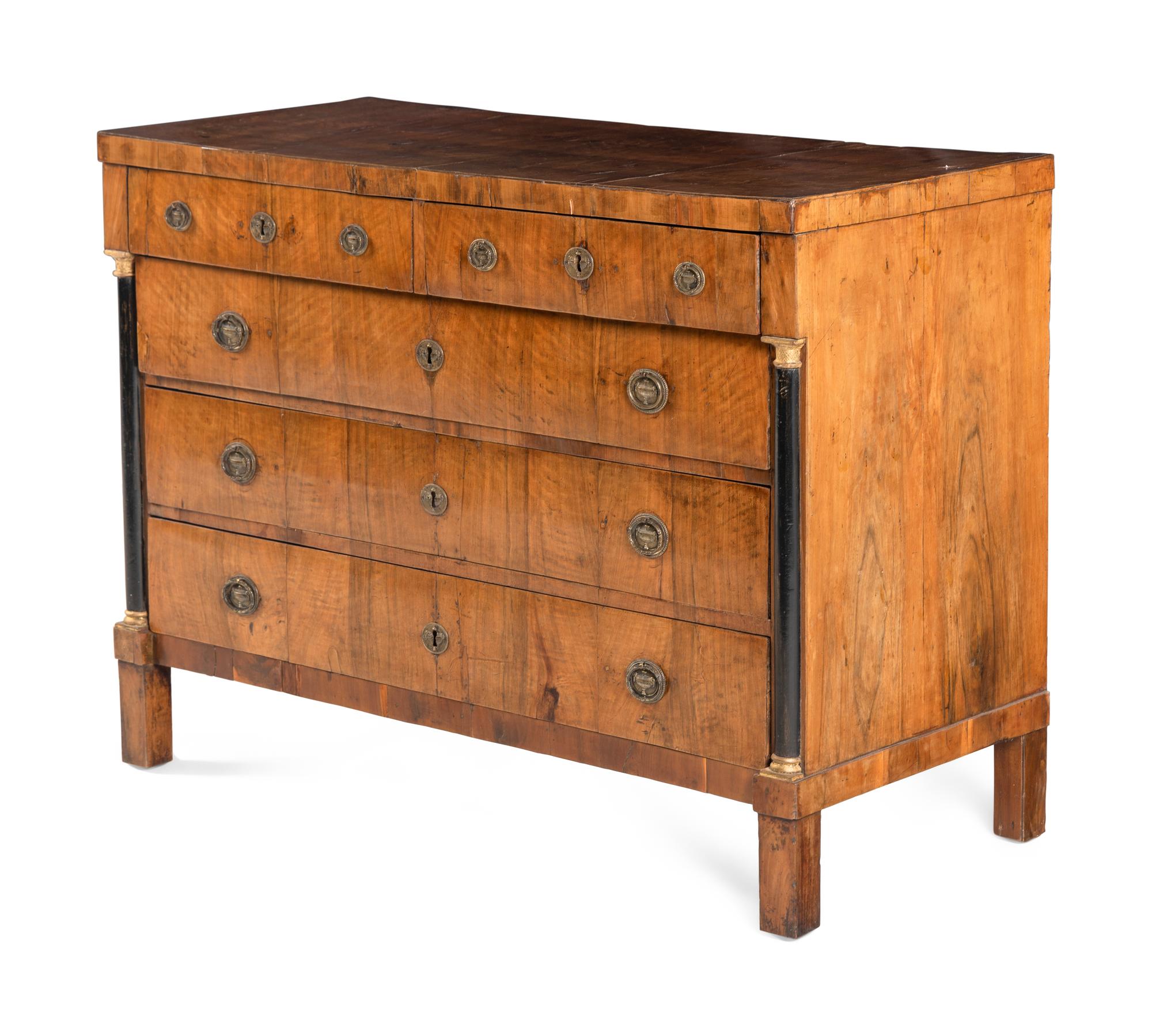 An Empire Walnut and Parcel Ebonized Commode