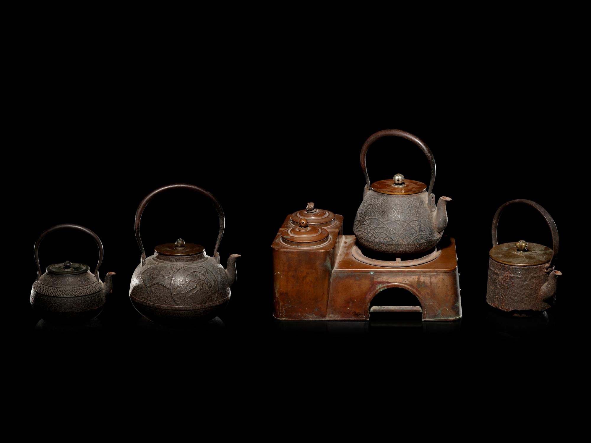 Four Japanese Cast Iron Teapots, Tetsubin , and Copper Burner Stand