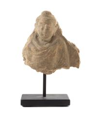A Small Gandharan Stucco Fragment Height 2 1/2 inches.