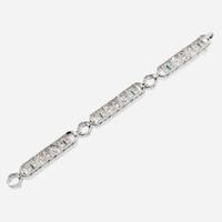 An Art Deco diamond, emerald, and platinum bracelet