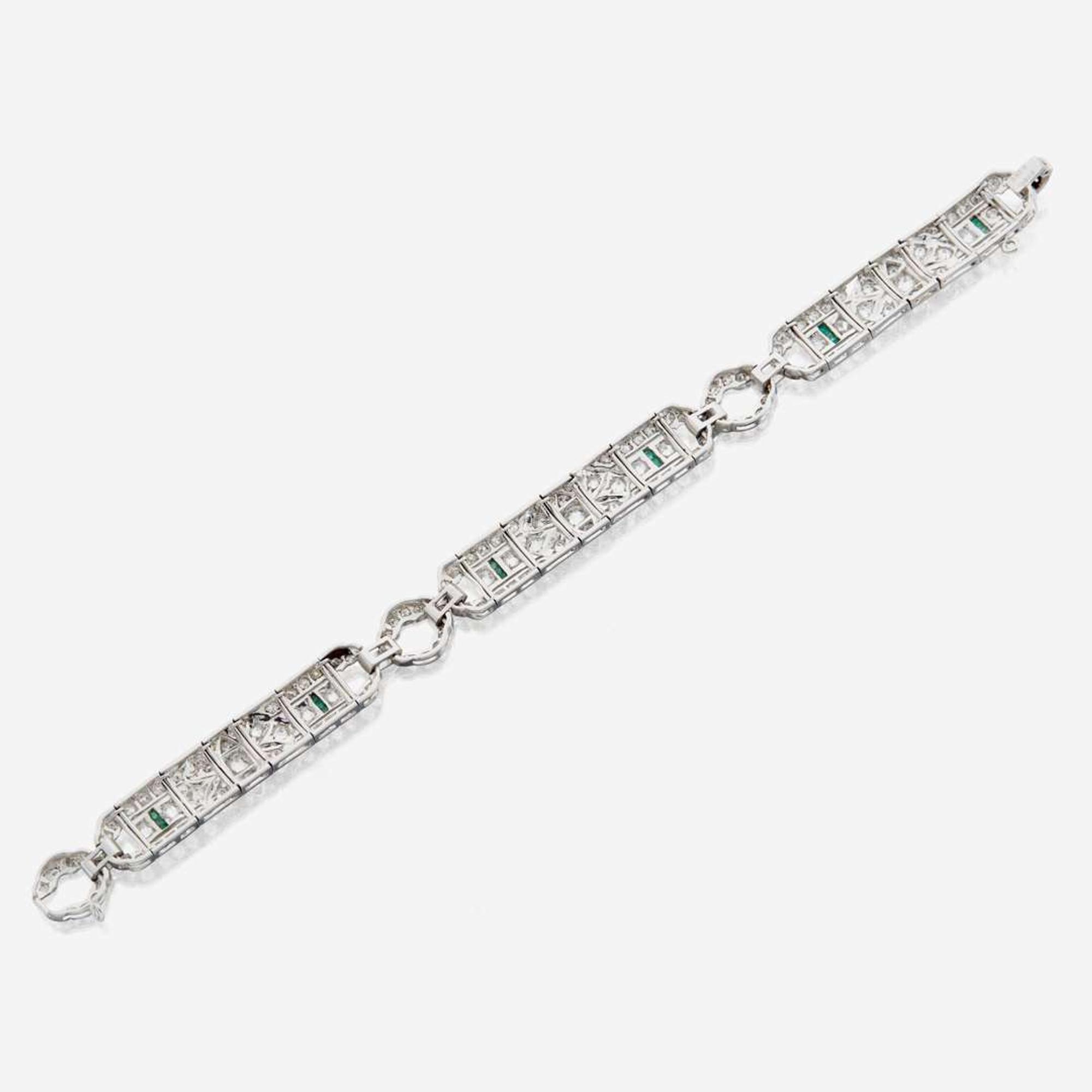 An Art Deco diamond, emerald, and platinum bracelet