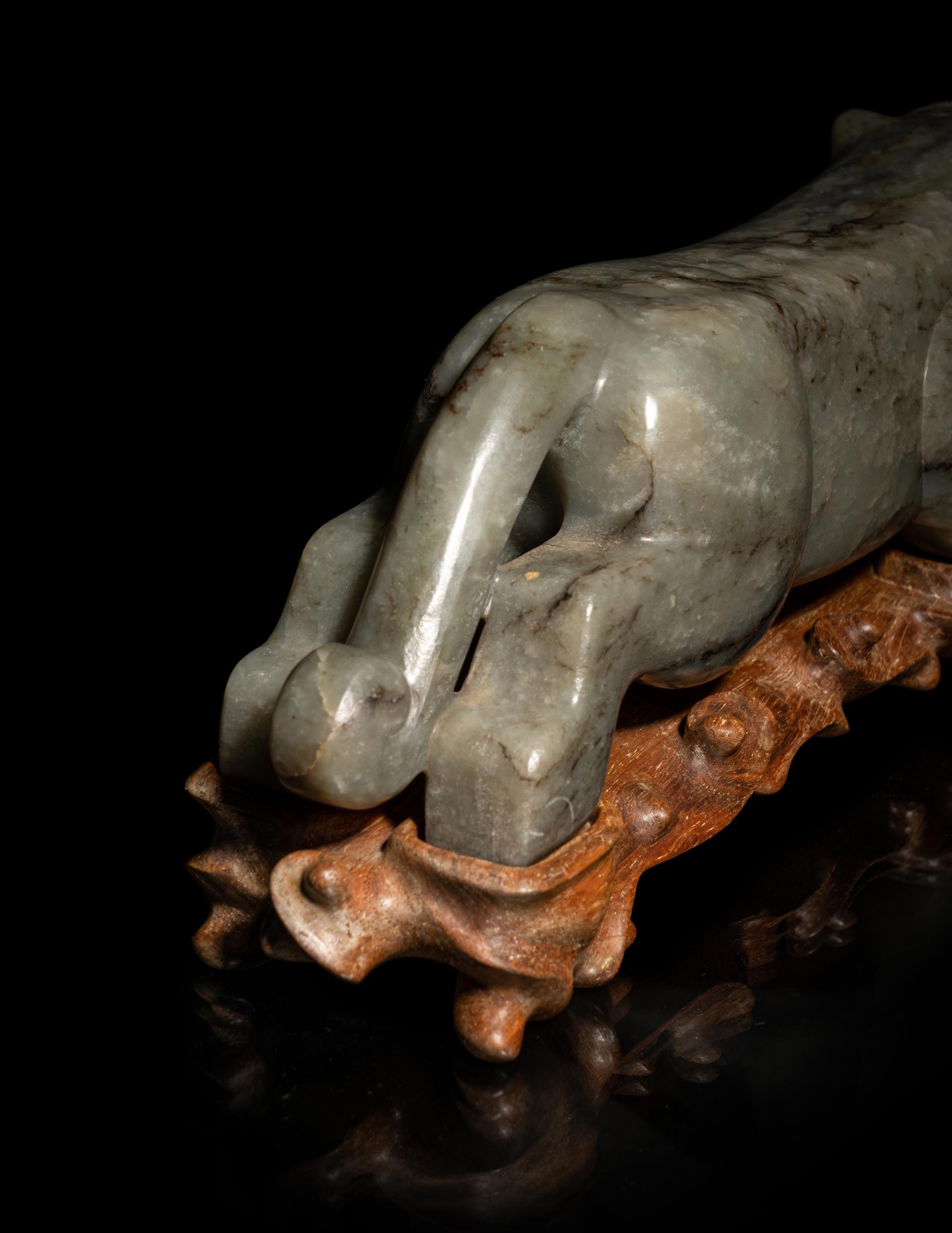 Two Chinese Mottled Jade Figures of Beasts