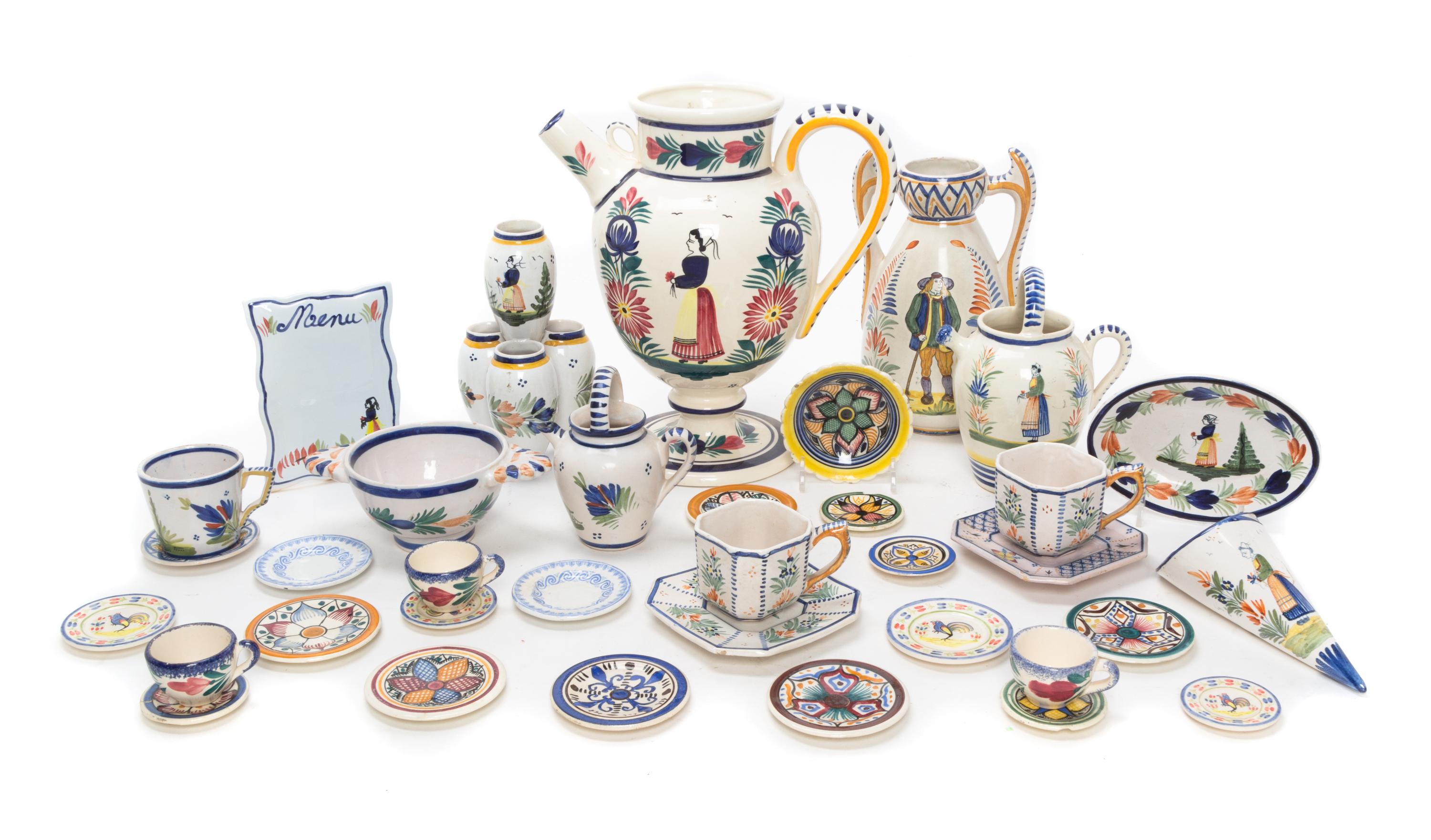 A Collection of Quimper Pottery Articles Height of first 10 1/2 inches.