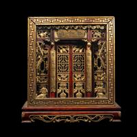 A Chinese Carved Gilt and Red Lacquered Wood Shrine