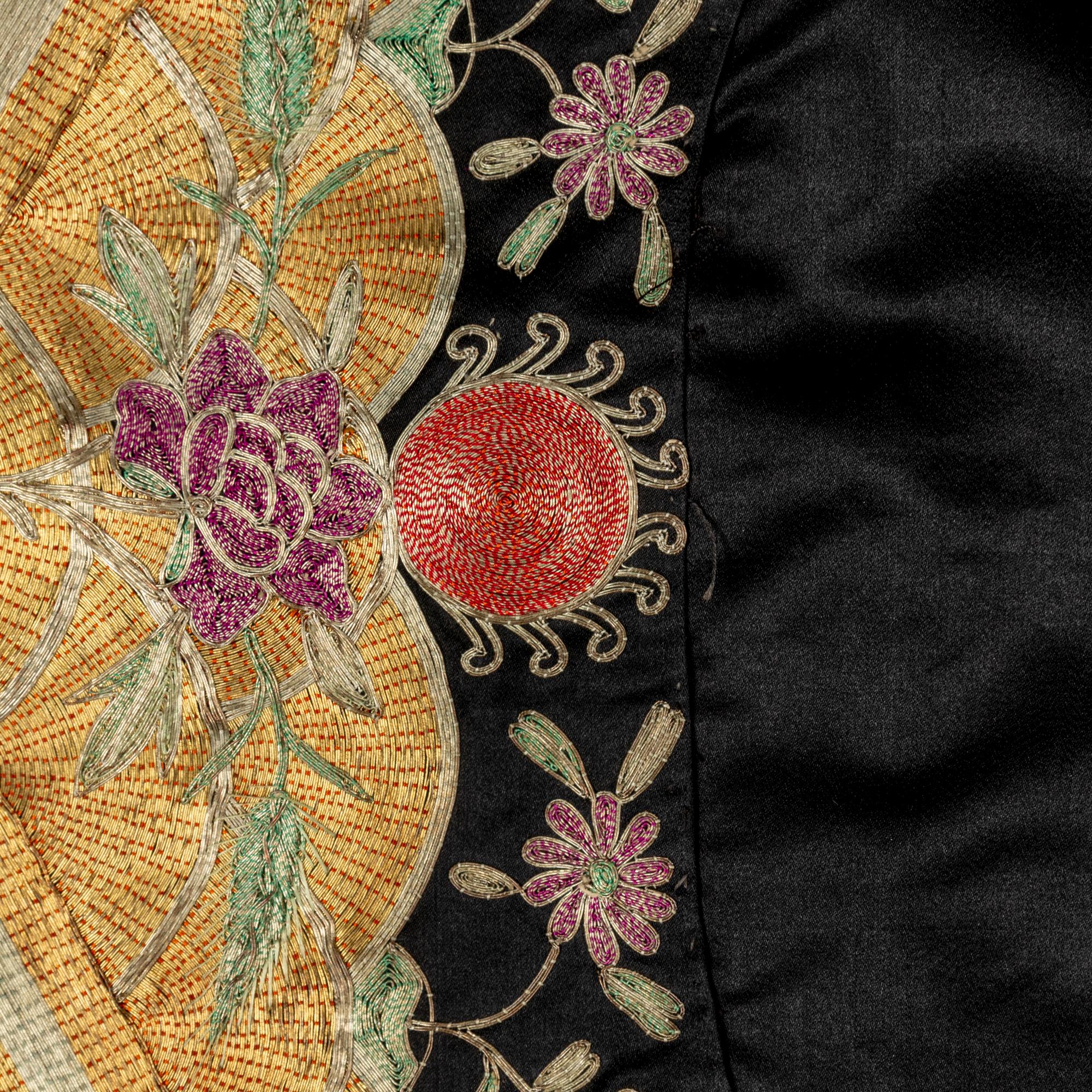 A Set of Chinese Navy Ground Embroidered Silk 'Crane' Jacket and Matching Pants, 19th Century 清晚期 石青地盤金綉團鶴紋女褂褲一套