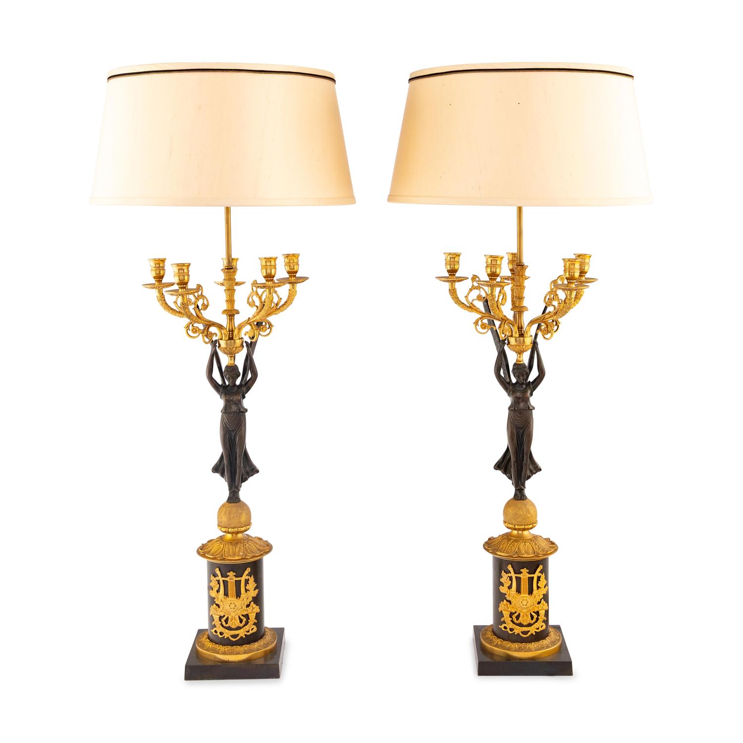 A Pair of Empire Style Gilt and Patinated Bronze Candelabra Mounted as Lamps