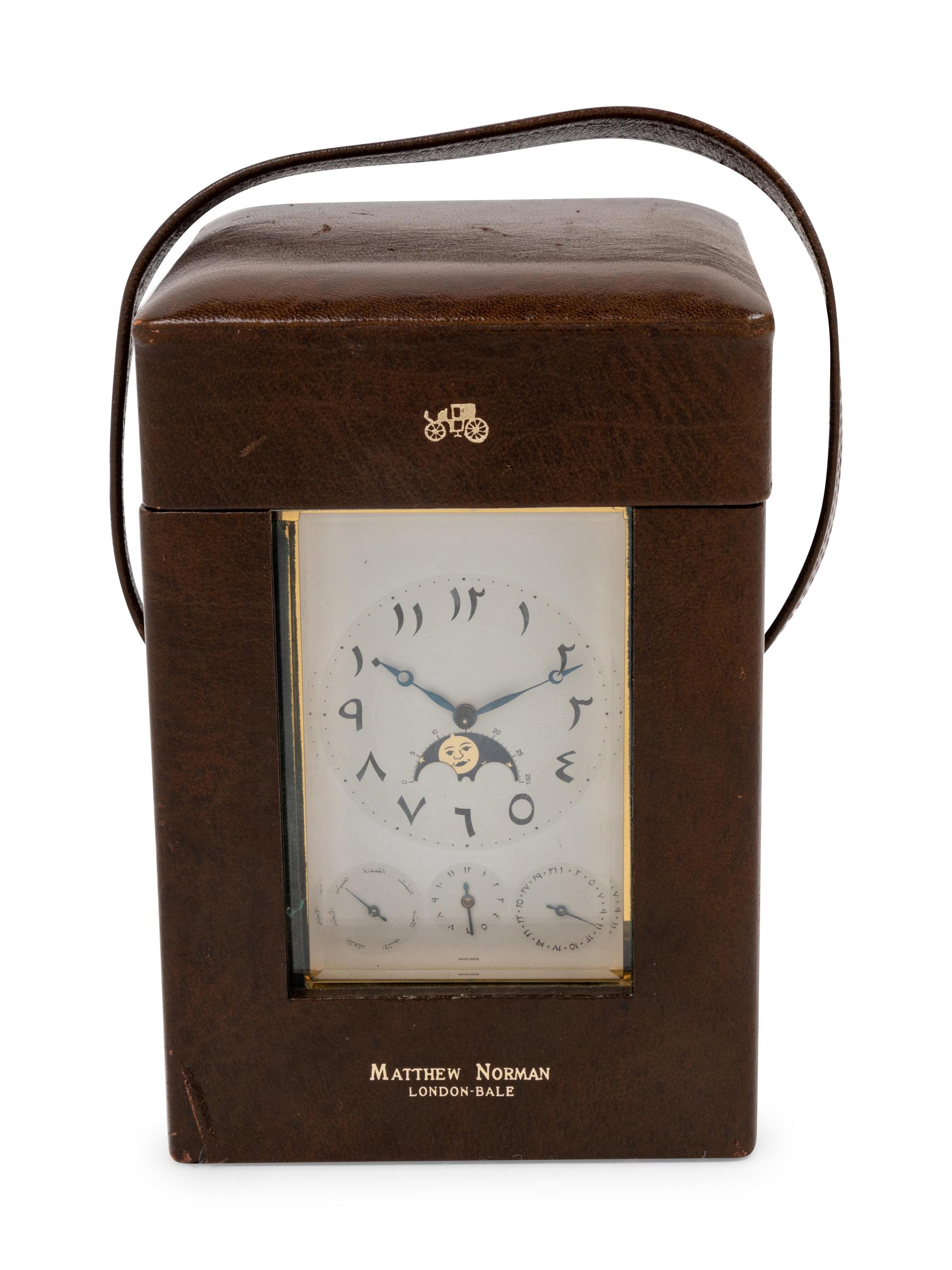 A Swiss Gilt Brass Carriage Clock