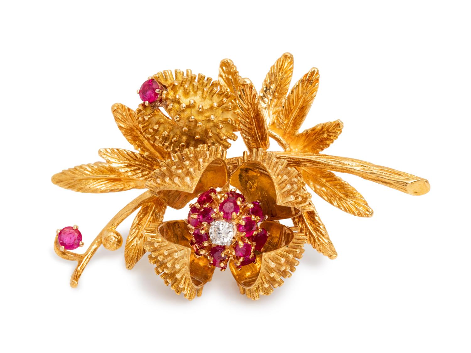 An 18 Karat Yellow Gold, Ruby and Diamond Articulated Floral Brooch,