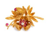 An 18 Karat Yellow Gold, Ruby and Diamond Articulated Floral Brooch,