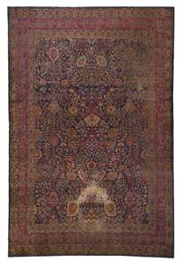 An Isfahan Wool Rug, 13 feet 6 inches x 11 feet 2 inches.