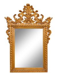 An Italian Baroque Style Giltwood Mirror