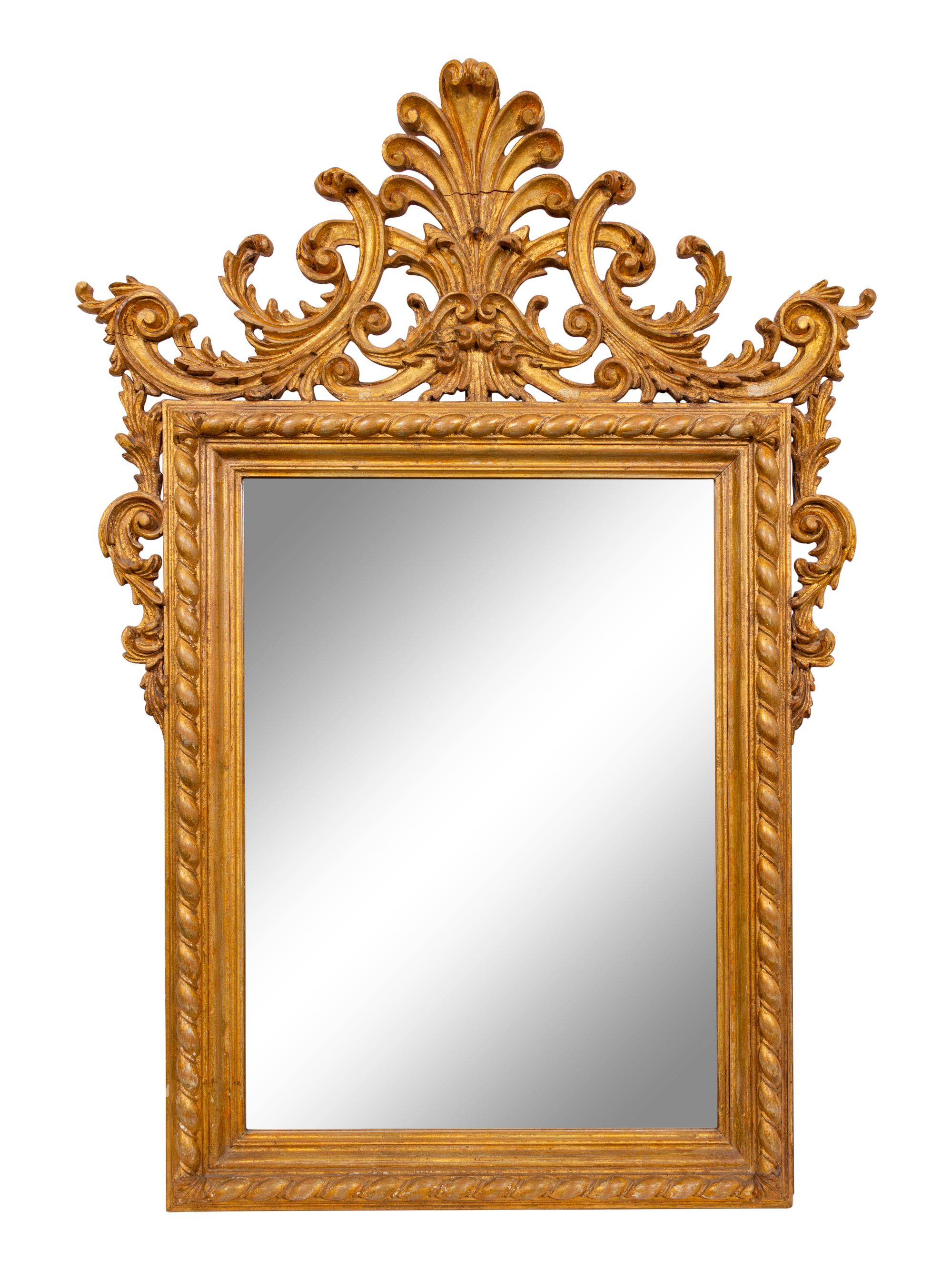 An Italian Baroque Style Giltwood Mirror