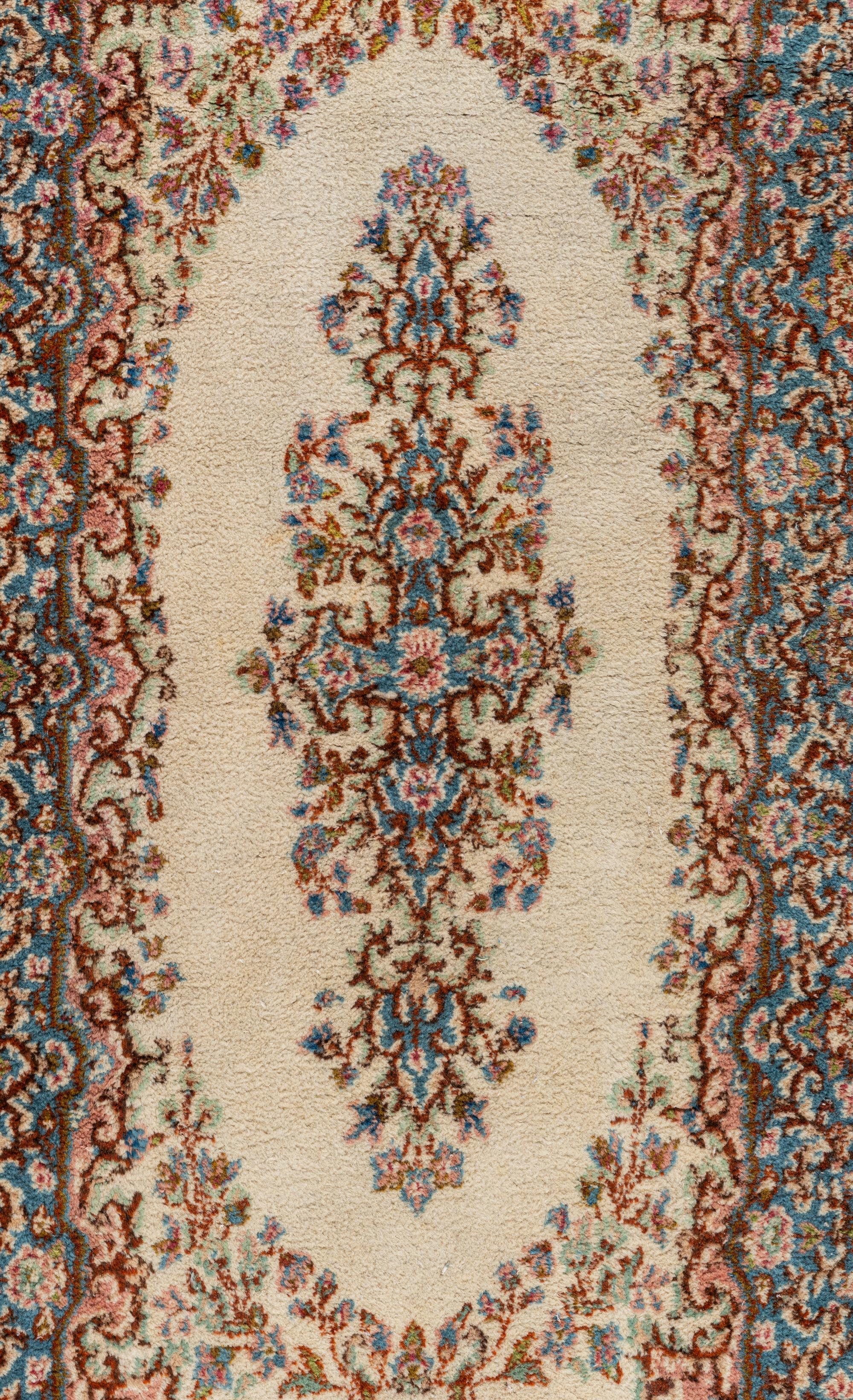 A Kirman Wool Rug