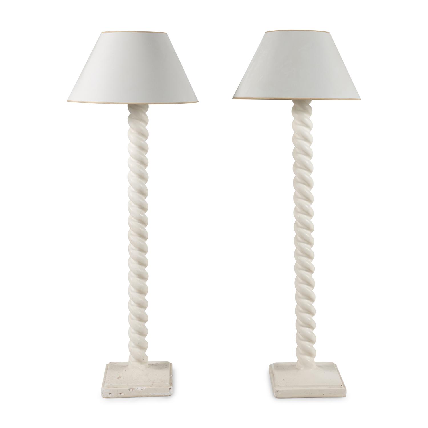 A Pair of White Composition Floor Lamps