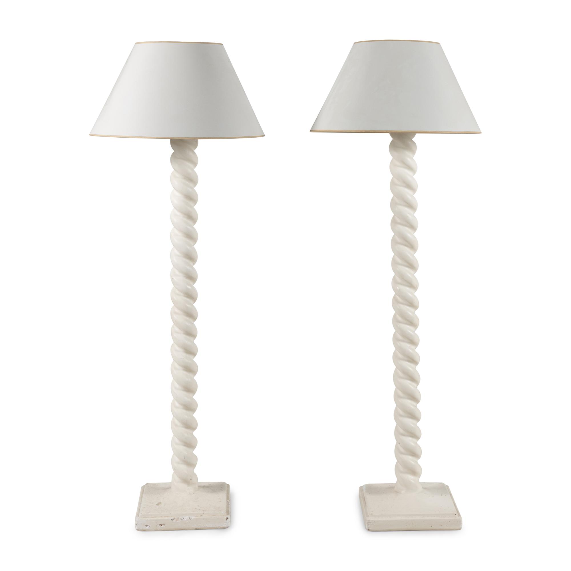 A Pair of White Composition Floor Lamps