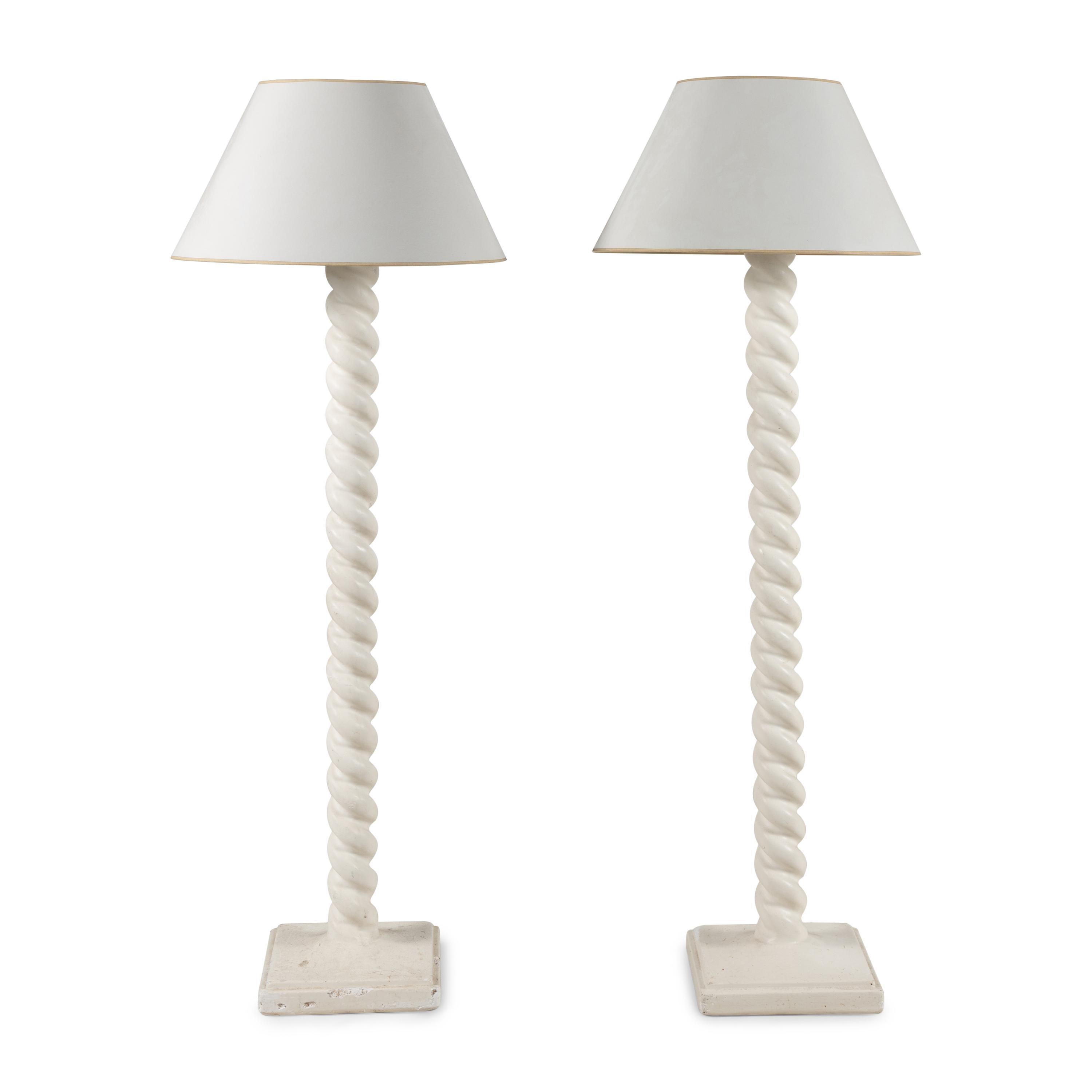 A Pair of White Composition Floor Lamps