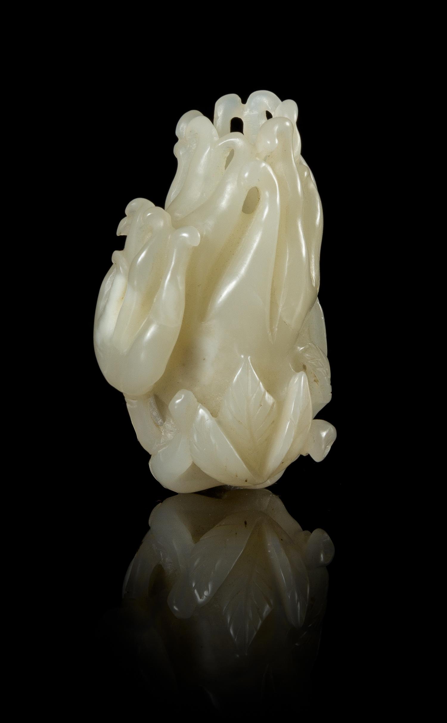 A Carved Celadon Jade Toggle Length 2 1/8 inches. — LATE QING DYNASTY