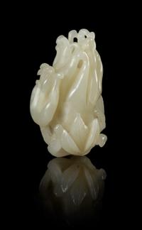 A Carved Celadon Jade Toggle Length 2 1/8 inches. — LATE QING DYNASTY