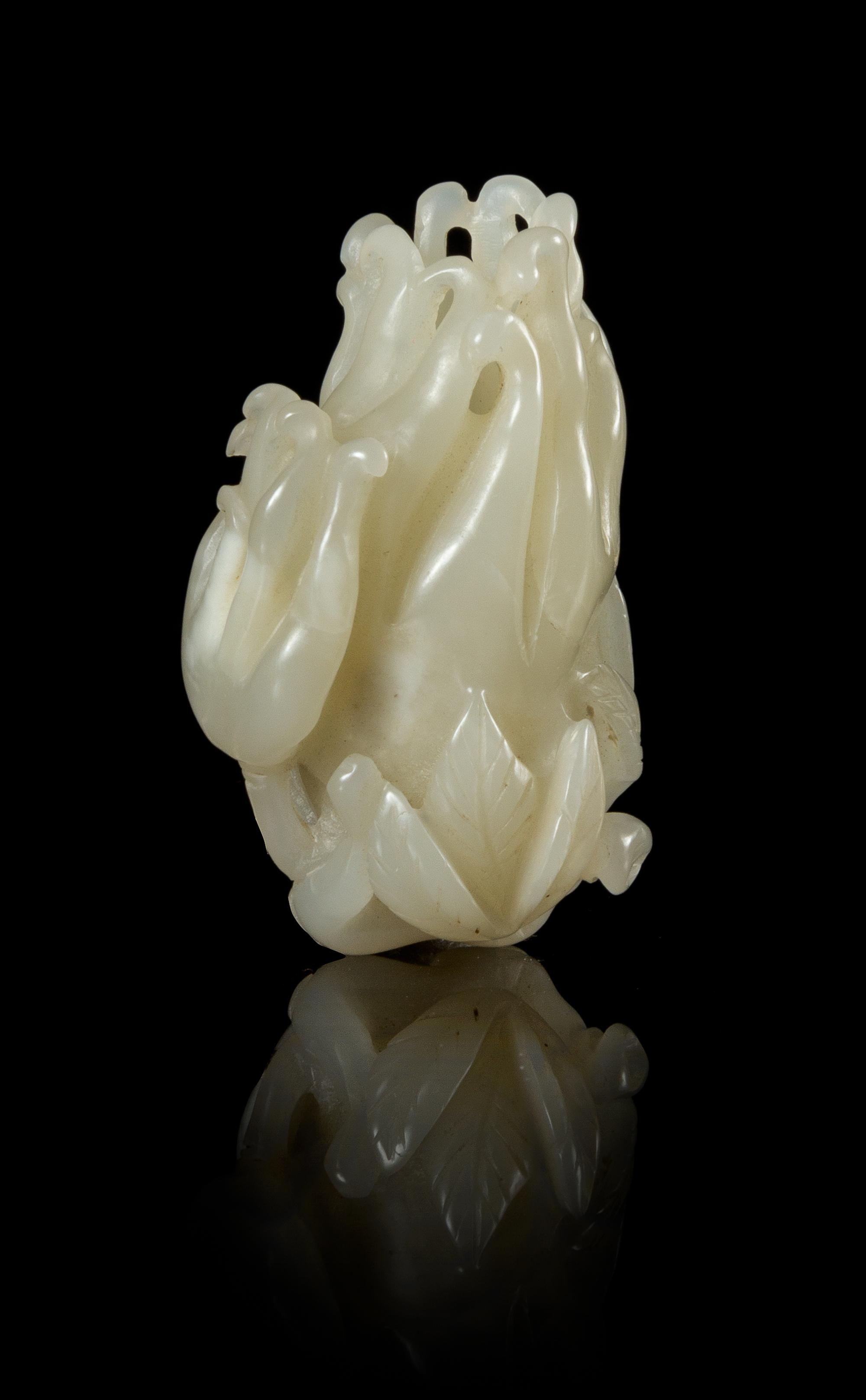 A Carved Celadon Jade Toggle Length 2 1/8 inches. — LATE QING DYNASTY