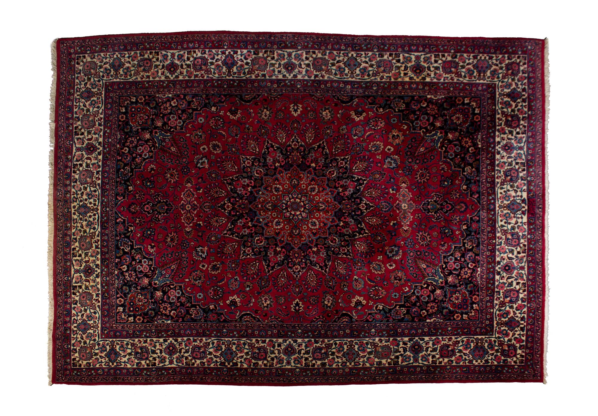 A Persian Wool Rug 13 feet 2 inches x 10 feet 2 inches. — 20TH CENTURY
