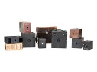 [EARLY PHOTOGRAPHY] 13 cameras incl. Kodak and Blair examples, with various manuals and guides.