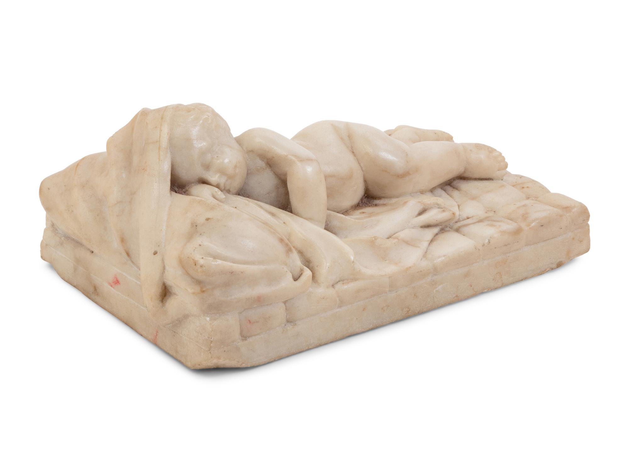 An Italian Carved Marble Figure of the Sleeping Christ Child