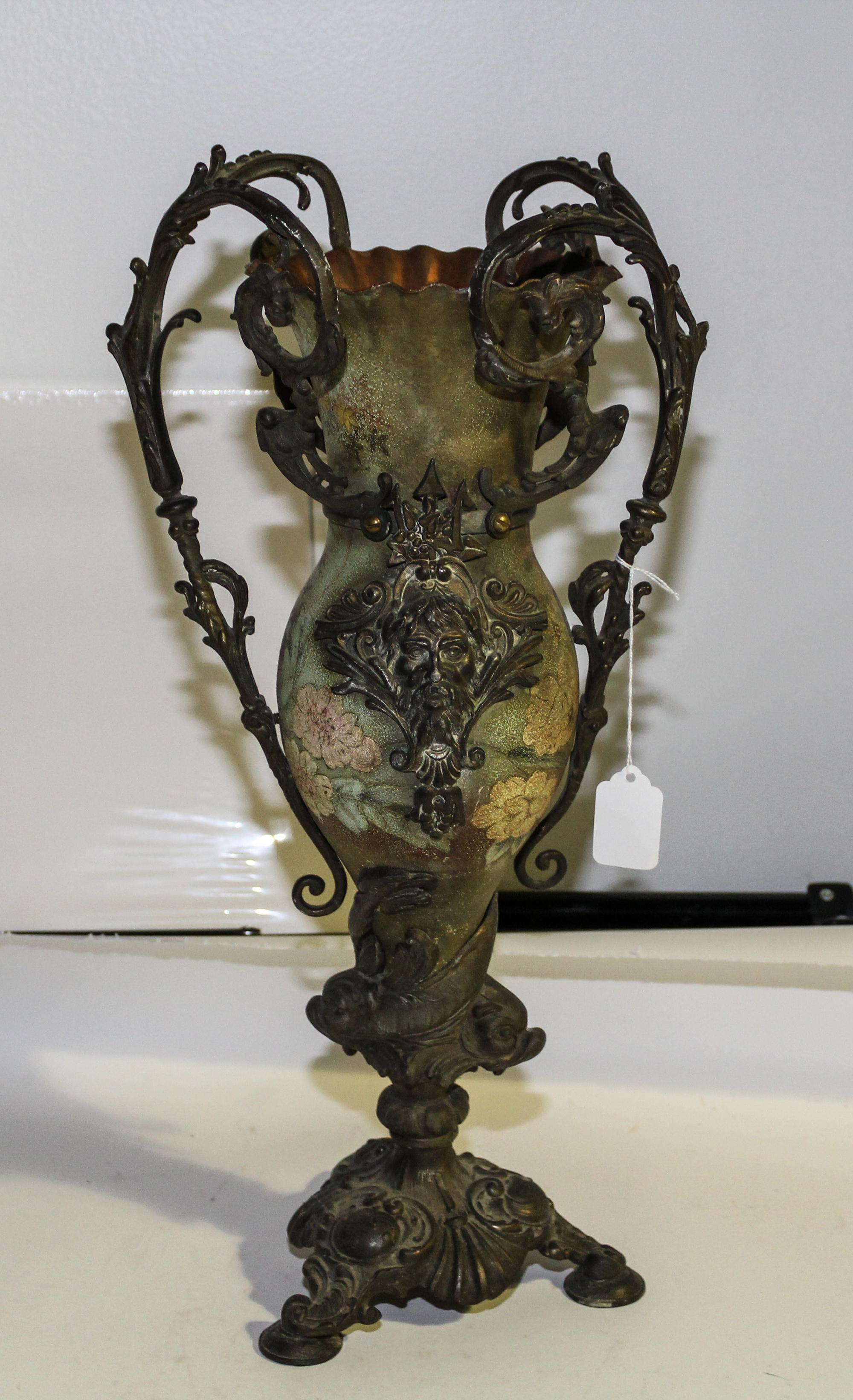 A Continental Polychrome and Cast Metal Vase. Height 19 inches.