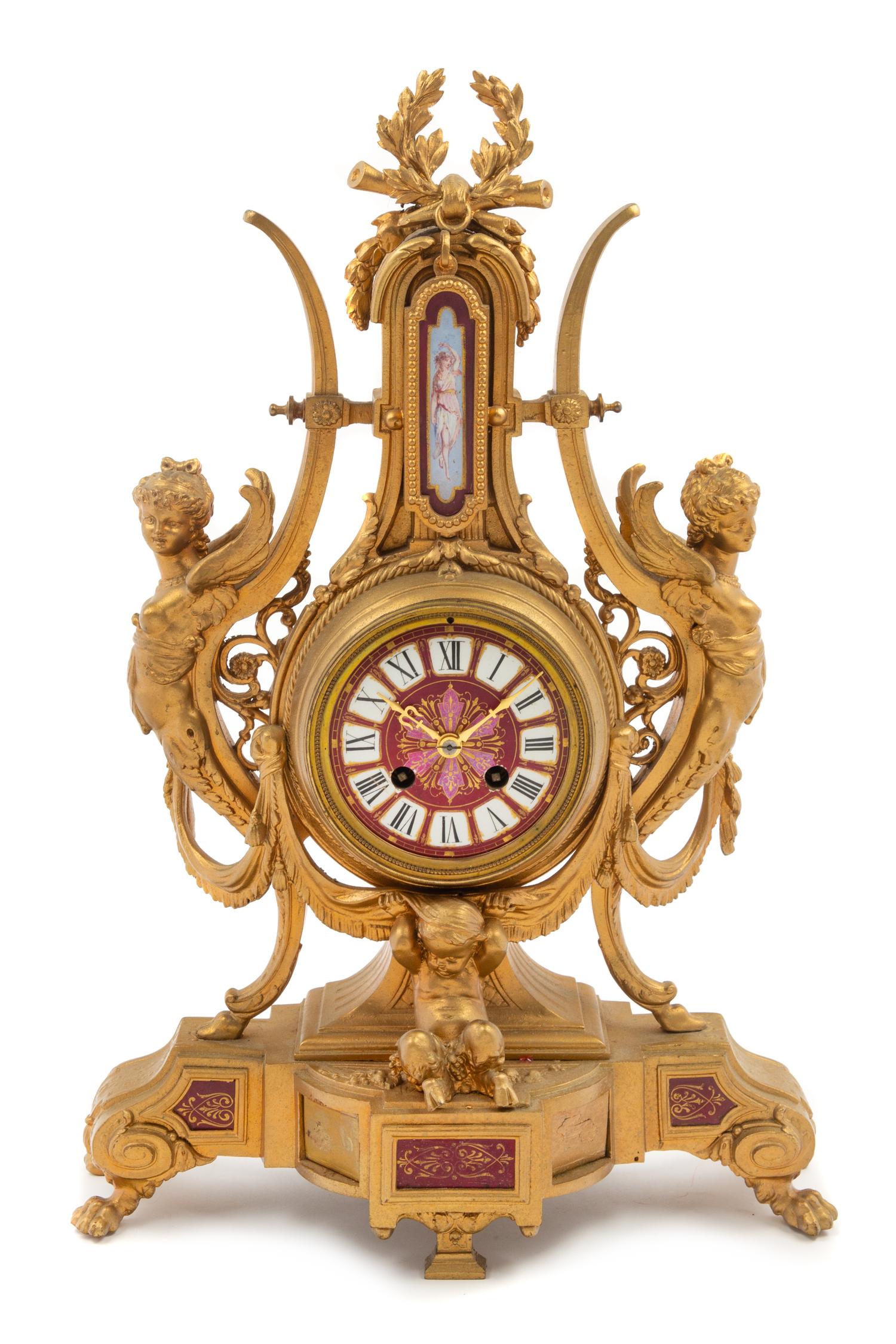A French Neoclassical Porcelain Mounted Gilt Metal Mantel Clock Height 19 x width 12 1/2 x depth 2 1/2 inches. — LATE 19TH CENTURY