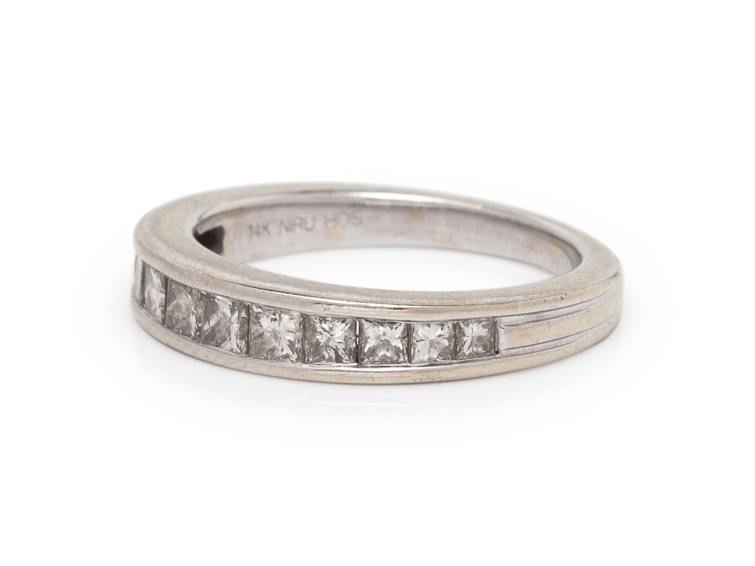 A 14 Karat White Gold and Diamond Ring,