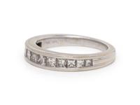 A 14 Karat White Gold and Diamond Ring,