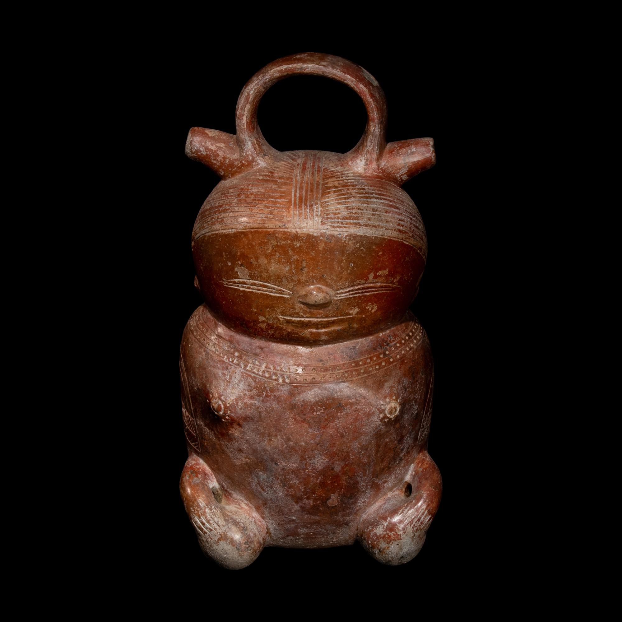 A Calima Redware Anthropomorphic Alcarraza