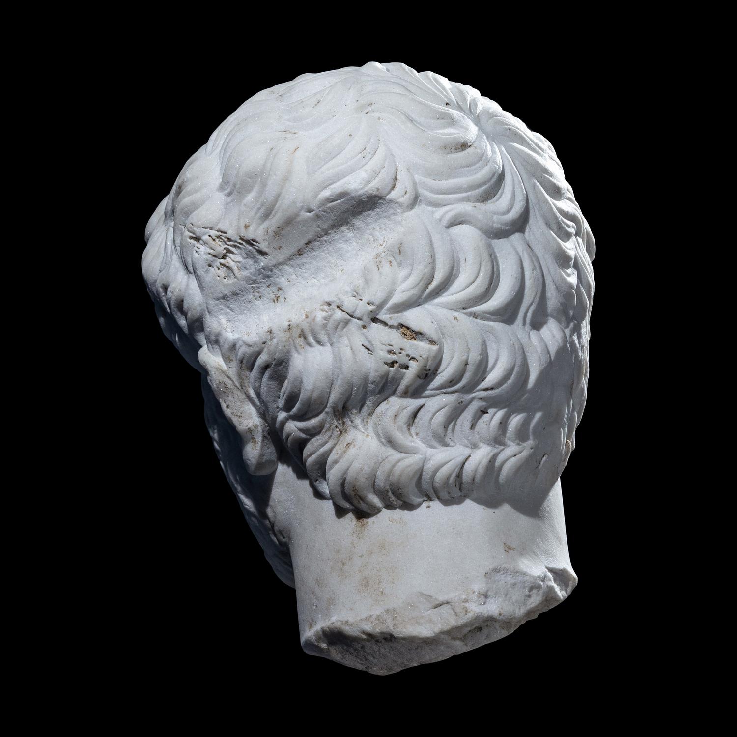 An Over Life-Size Roman Marble Portrait Head of Emperor Hadrian
