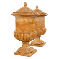 A Pair of Continental Carved Marble Covered Urns