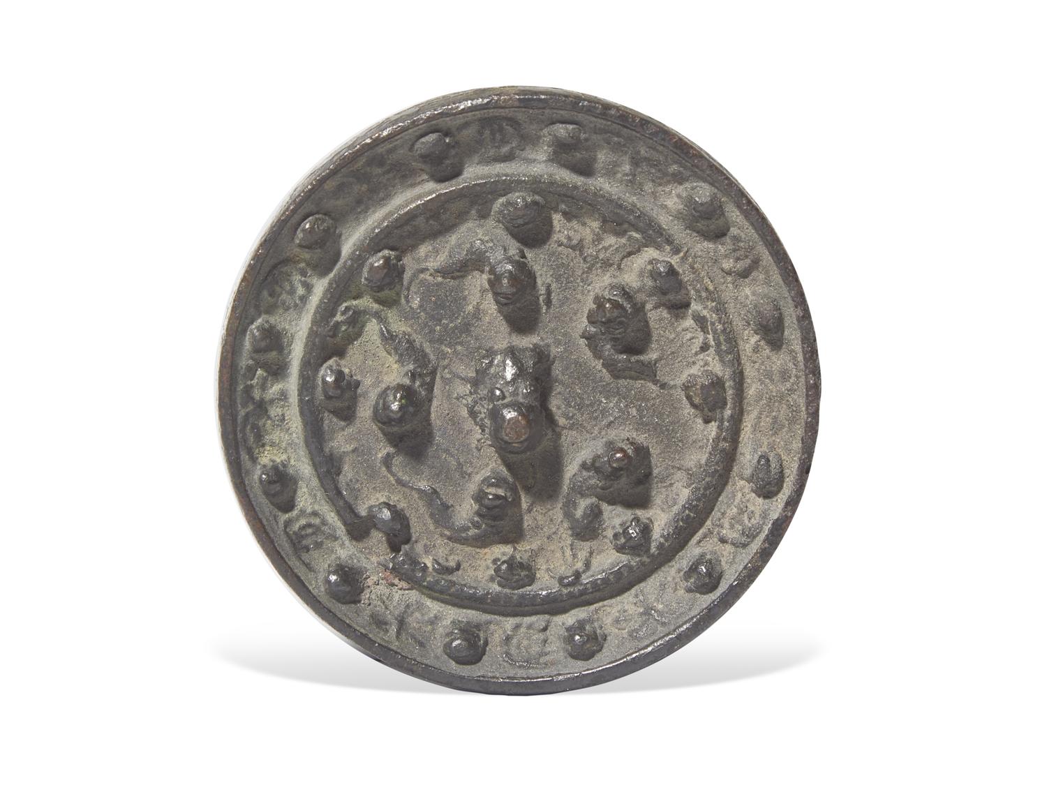 Two Chinese Copper Hand Warmers and A Small Bronze Mirror