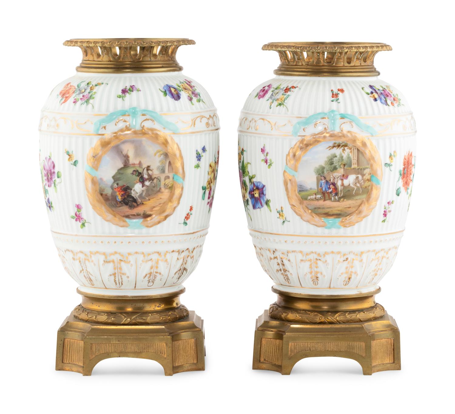 A Pair of German Gilt Bronze Mounted Porcelain Urns