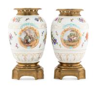 A Pair of German Gilt Bronze Mounted Porcelain Urns