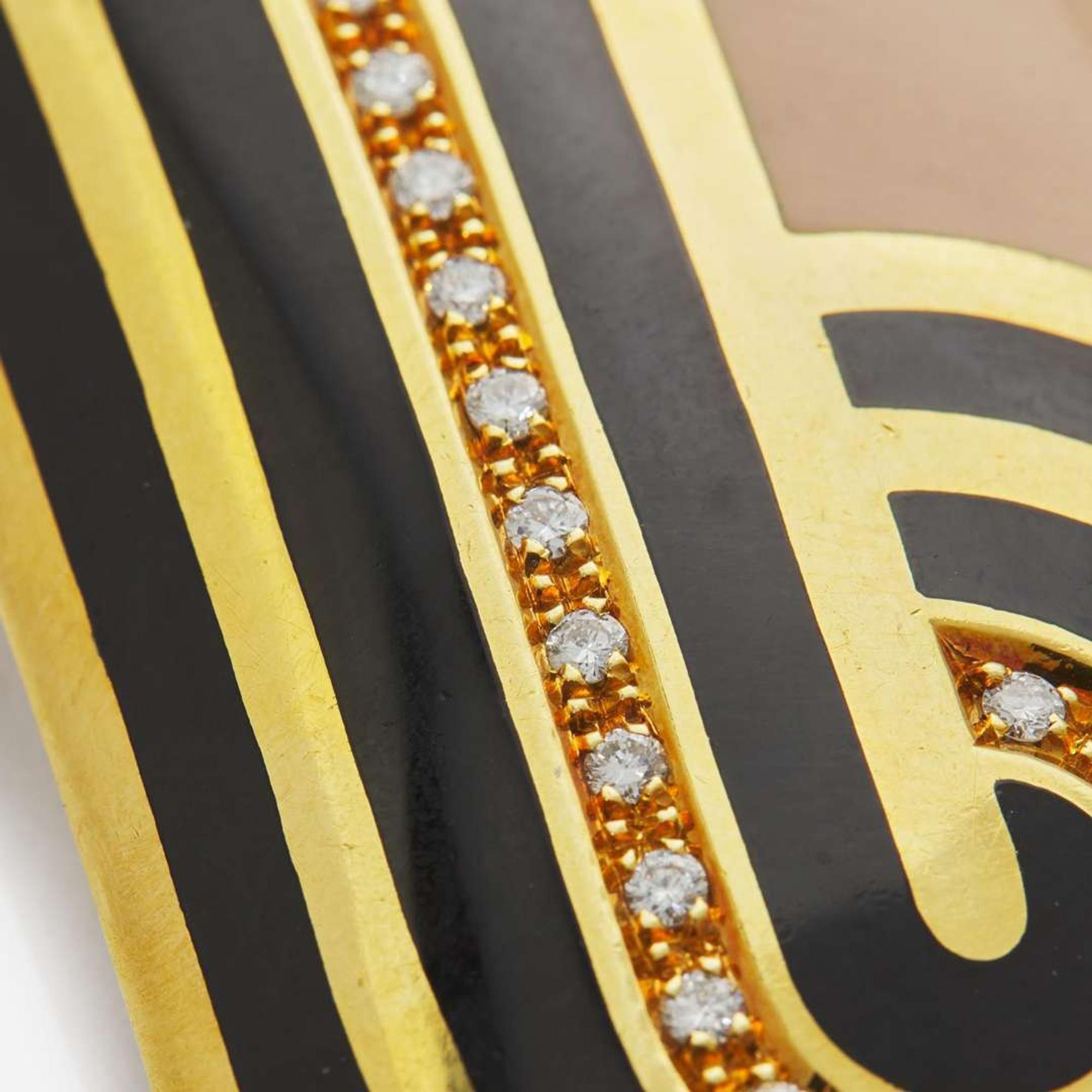 A Suite of Cartier Earrings and Pendant c. 1975