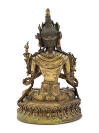 A Tibetan Gilt Bronze Seated Figure of Maitreya