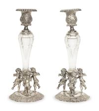 A Pair of German Silver and Cut Glass Figural Candlesticks