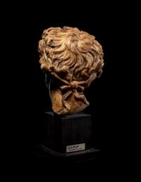 A Roman Marble Head of a Satyr