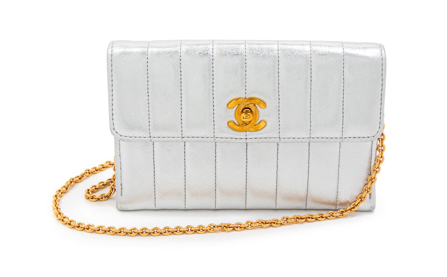 A Chanel Silver Quilted Leather Mini Flap Shoulder Bag, 6 1/2 x 4 x 2 inches.
