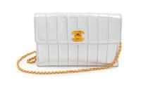 A Chanel Silver Quilted Leather Mini Flap Shoulder Bag, 6 1/2 x 4 x 2 inches.