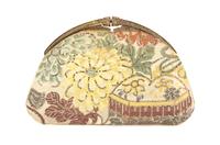 A Judith Leiber Champagne Embroidered Clutch, 9 1/2 x 6 x 1 inches.