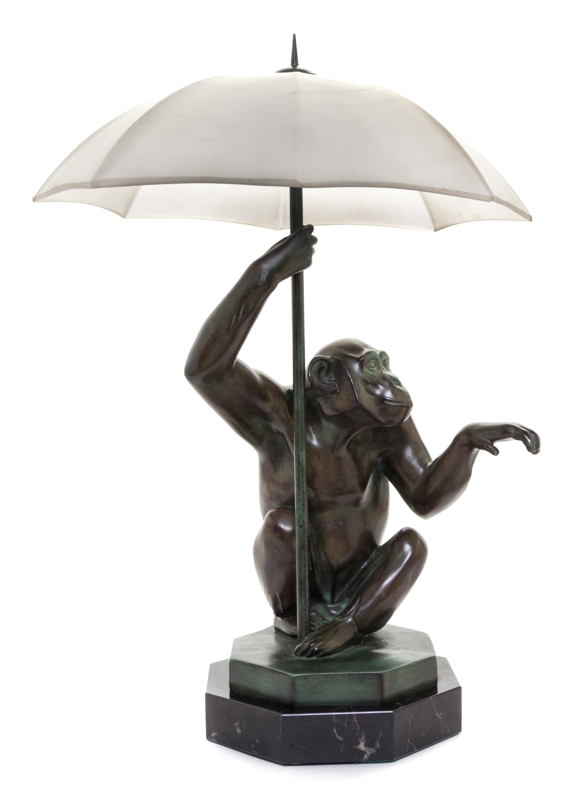 A French Bronze Figural Table Lamp Height overall 17 inches.