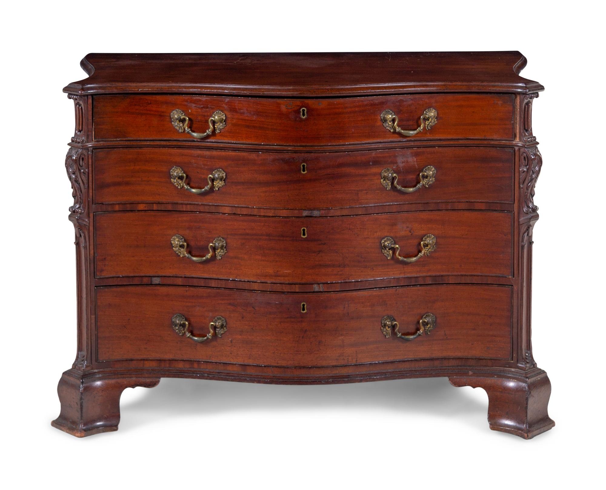 A George III Carved Mahogany Chest of Drawers